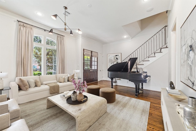 1206 Lake Pointe Pkwy, Sugar Land, TX 77478 - living area with dark wood-style floors, recessed lighting, stairway, and crown molding