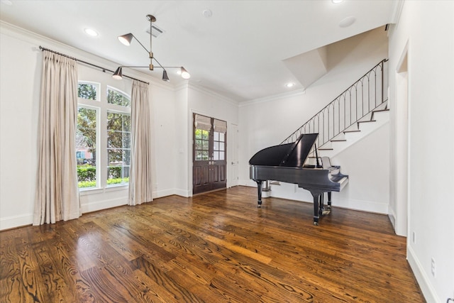 1206 Lake Pointe Pkwy, Sugar Land, TX 77478 - entrance foyer featuring ornamental molding, wood finished floors, stairway, and recessed lighting