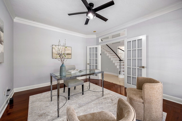 427 Crestwater Trl, Houston, TX 77082 - office space featuring ceiling fan, crown molding, wood finished floors, french doors, and a textured ceiling