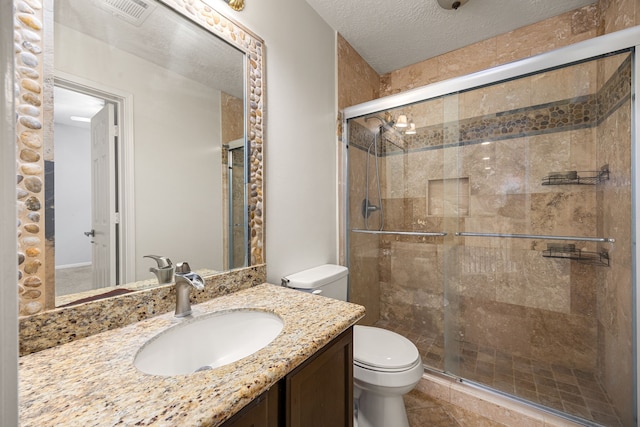 427 Crestwater Trl, Houston, TX 77082 - full bathroom featuring vanity, a stall shower, and a textured ceiling