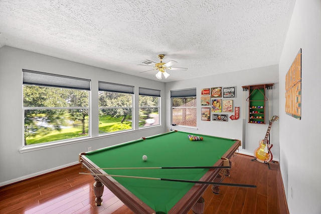 427 Crestwater Trl, Houston, TX 77082 - game room featuring pool table, wood finished floors, ceiling fan, and a textured ceiling