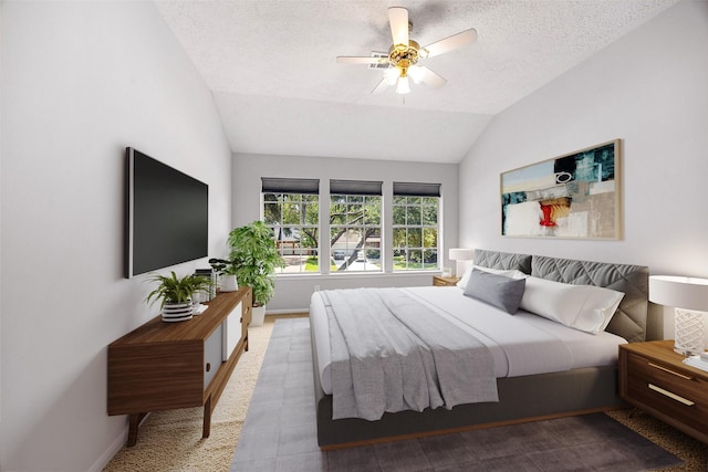 427 Crestwater Trl, Houston, TX 77082 - bedroom featuring lofted ceiling, a textured ceiling, a ceiling fan, and carpet floors