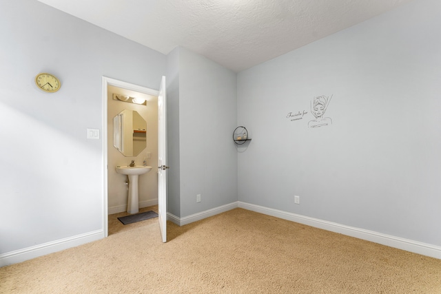 427 Crestwater Trl, Houston, TX 77082 - unfurnished bedroom featuring light carpet and baseboards