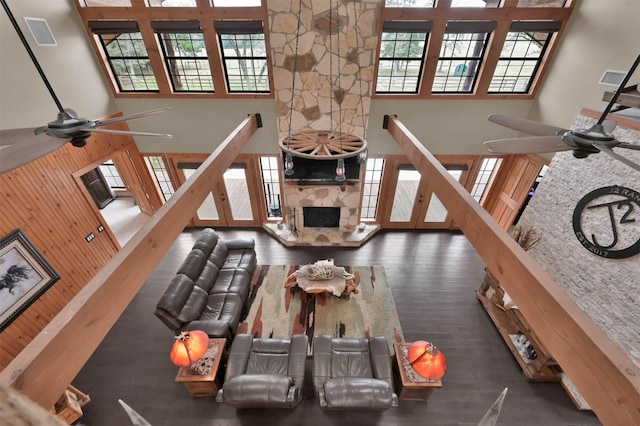 28540 Lynnwood Ln, Hempstead, TX 77445 - living area with ceiling fan, a towering ceiling, a fireplace, and wood finished floors
