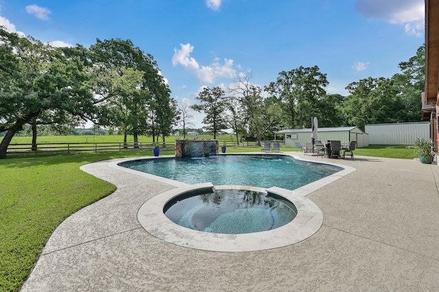28540 Lynnwood Ln, Hempstead, TX 77445 - view of swimming pool with a pool with connected hot tub, a patio, and an outbuilding