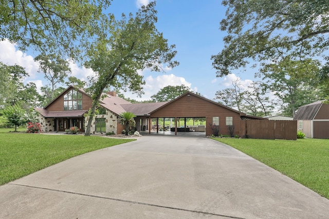 28540 Lynnwood Ln, Hempstead, TX 77445 - view of front facade featuring concrete driveway and a carport