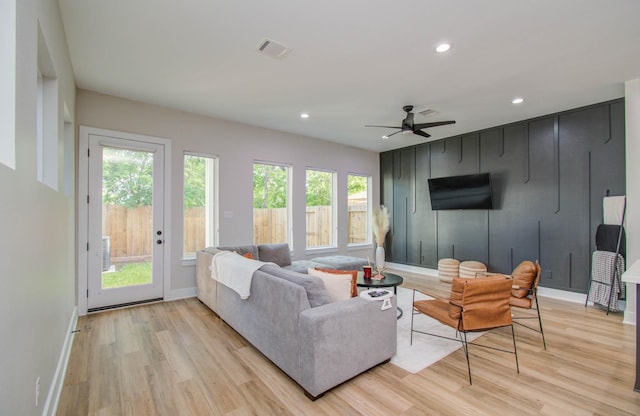 4612 Oats St, Houston, TX 77020 - living room with light wood-style flooring, ceiling fan, and recessed lighting
