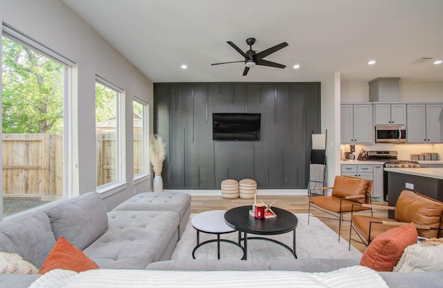 4612 Oats St, Houston, TX 77020 - living room with recessed lighting, light wood-style flooring, and ceiling fan