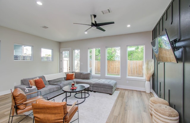 4612 Oats St, Houston, TX 77020 - living room with light wood finished floors, recessed lighting, and a ceiling fan