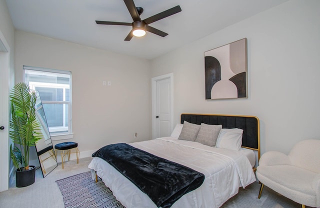 4612 Oats St, Houston, TX 77020 - carpeted bedroom featuring baseboards and a ceiling fan