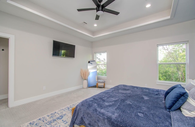 4612 Oats St, Houston, TX 77020 - carpeted bedroom featuring a raised ceiling, recessed lighting, and a ceiling fan