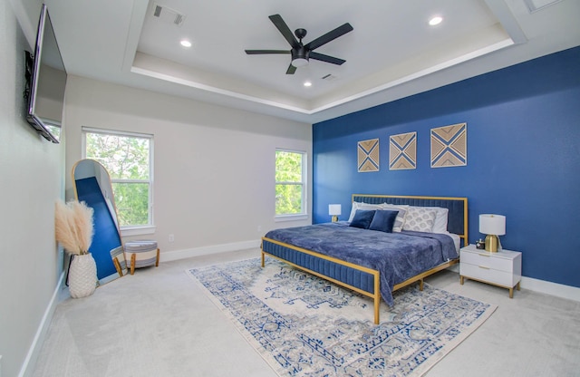 4612 Oats St, Houston, TX 77020 - carpeted bedroom featuring a raised ceiling, recessed lighting, and a ceiling fan