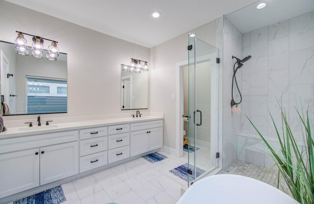 4612 Oats St, Houston, TX 77020 - full bath with a shower stall, marble finish flooring, double vanity, and recessed lighting