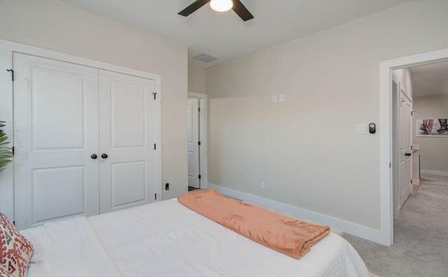 4612 Oats St, Houston, TX 77020 - bedroom featuring a closet, light colored carpet, and ceiling fan