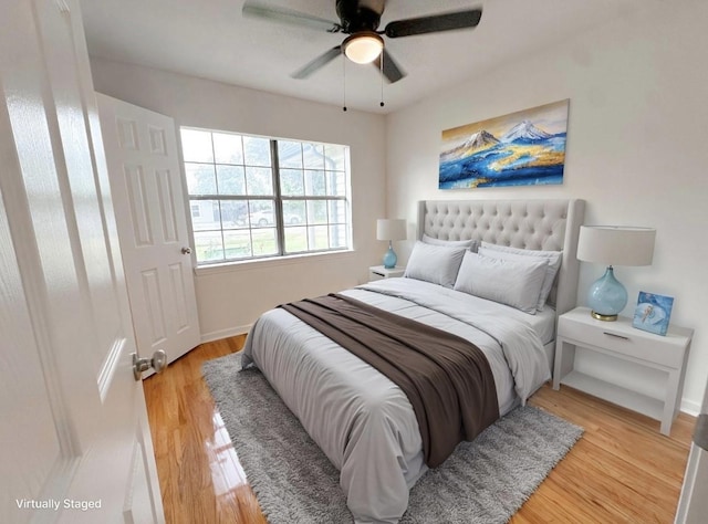11026 Catamore St, Houston, TX 77076 - bedroom featuring light wood-style floors and ceiling fan