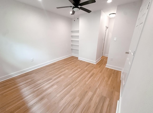 11026 Catamore St, Houston, TX 77076 - unfurnished room with ceiling fan, light wood finished floors, and recessed lighting
