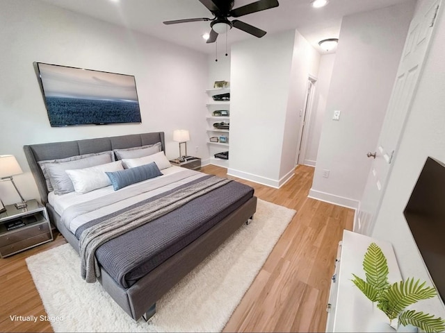 11026 Catamore St, Houston, TX 77076 - bedroom with recessed lighting, light wood finished floors, and a ceiling fan