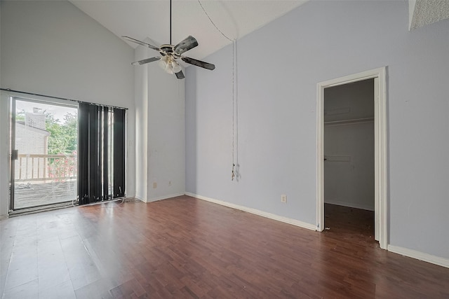 11280 Braes Forest Dr Unit 105, Houston, TX 77071 - empty room with high vaulted ceiling, a ceiling fan, and wood finished floors