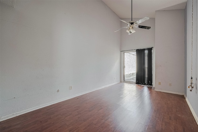 11280 Braes Forest Dr Unit 105, Houston, TX 77071 - unfurnished room featuring dark wood-style floors, ceiling fan, and high vaulted ceiling