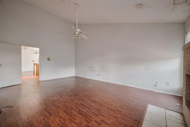 11280 Braes Forest Dr Unit 105, Houston, TX 77071 - unfurnished room with ceiling fan, wood finished floors, and vaulted ceiling