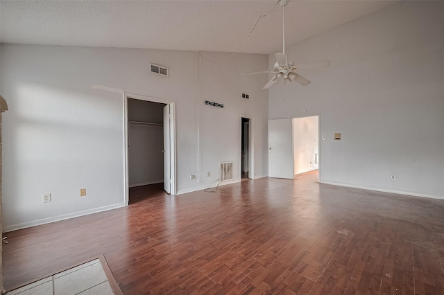 11280 Braes Forest Dr Unit 105, Houston, TX 77071 - unfurnished bedroom with wood finished floors, high vaulted ceiling, and a spacious closet