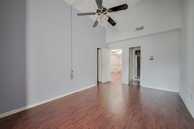 11280 Braes Forest Dr Unit 105, Houston, TX 77071 - empty room with ceiling fan, dark wood-style flooring, and high vaulted ceiling