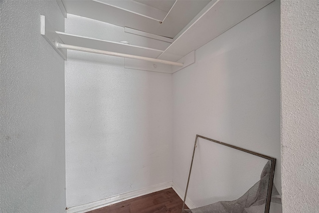 11280 Braes Forest Dr Unit 105, Houston, TX 77071 - walk in closet featuring wood finished floors