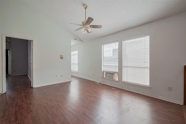 11280 Braes Forest Dr Unit 105, Houston, TX 77071 - empty room with a ceiling fan, cooling unit, a textured ceiling, wood finished floors, and high vaulted ceiling