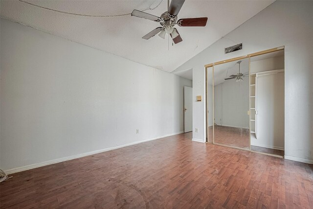 11280 Braes Forest Dr Unit 105, Houston, TX 77071 - unfurnished bedroom with wood finished floors, a closet, a ceiling fan, and high vaulted ceiling