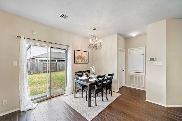 6707 Enchanted Crest Dr, Katy, TX 77449 - dining area with a chandelier and wood finished floors