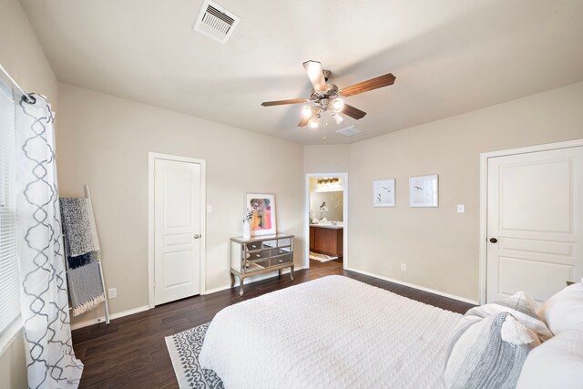 6707 Enchanted Crest Dr, Katy, TX 77449 - bedroom featuring dark wood finished floors, ceiling fan, and ensuite bath