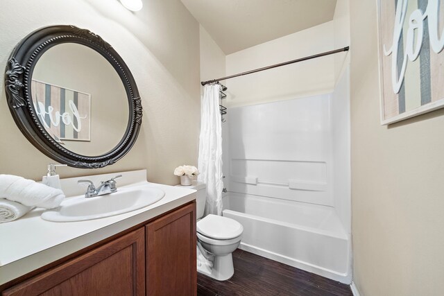 6707 Enchanted Crest Dr, Katy, TX 77449 - full bath with wood finished floors, vanity, and shower / bath combination with curtain