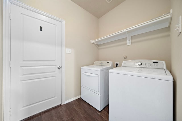 6707 Enchanted Crest Dr, Katy, TX 77449 - laundry room featuring washer and clothes dryer and dark wood finished floors
