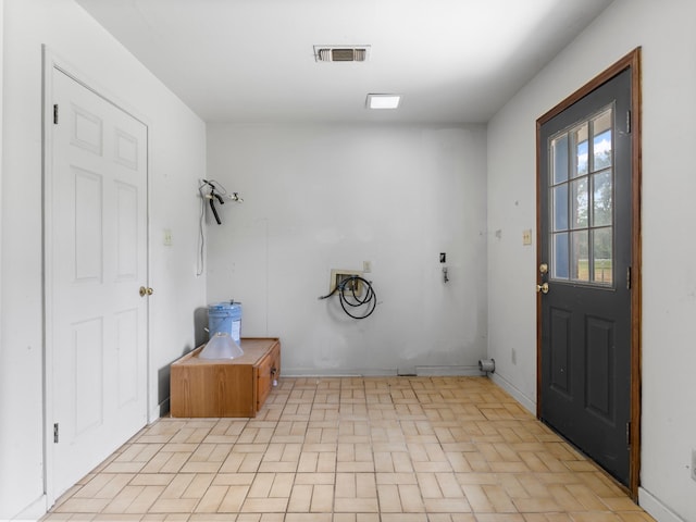 4432 County Road 886, Brazoria, TX 77422 - washroom with brick patterned flooring and washer hookup
