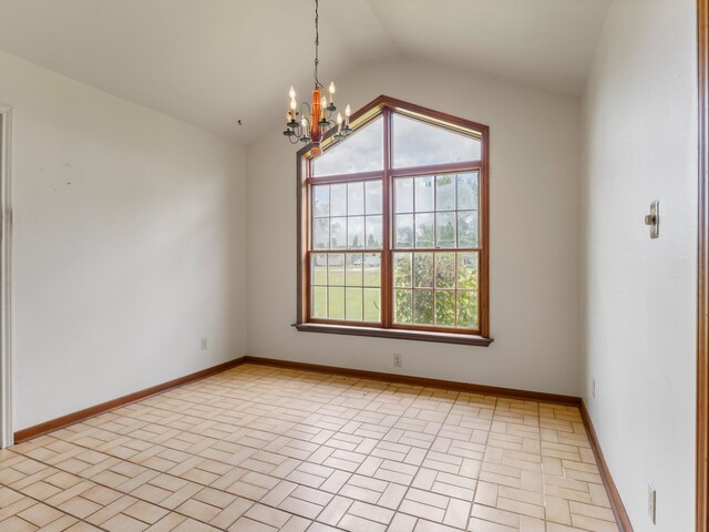 4432 County Road 886, Brazoria, TX 77422 - empty room with a chandelier, vaulted ceiling, and plenty of natural light