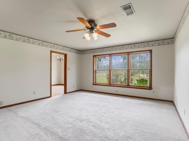 4432 County Road 886, Brazoria, TX 77422 - carpeted empty room featuring baseboards and a ceiling fan