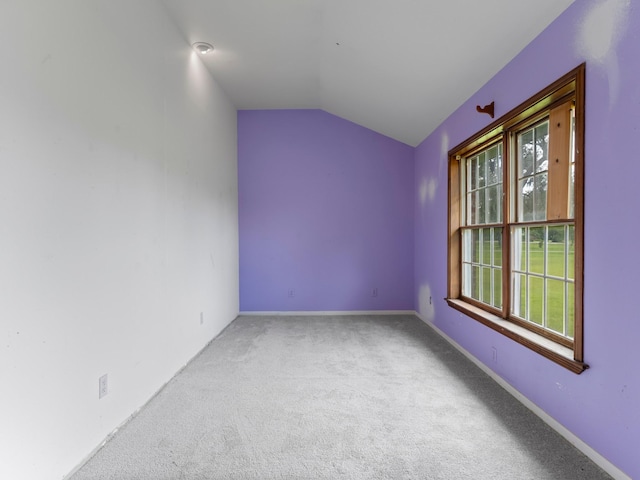 4432 County Road 886, Brazoria, TX 77422 - carpeted spare room featuring lofted ceiling and baseboards