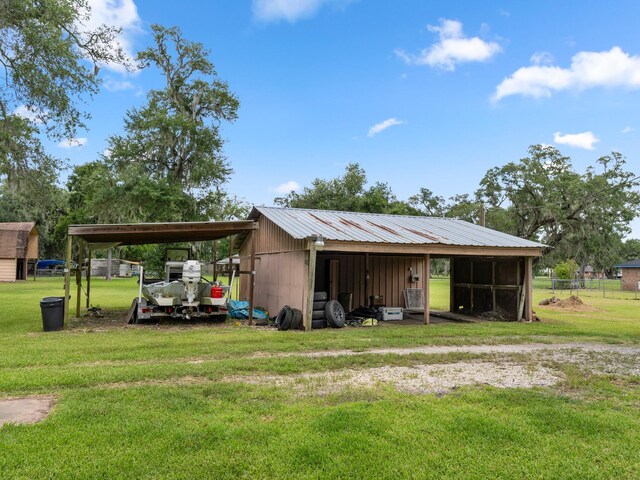 4432 County Road 886, Brazoria, TX 77422 - view of pole building with a carport