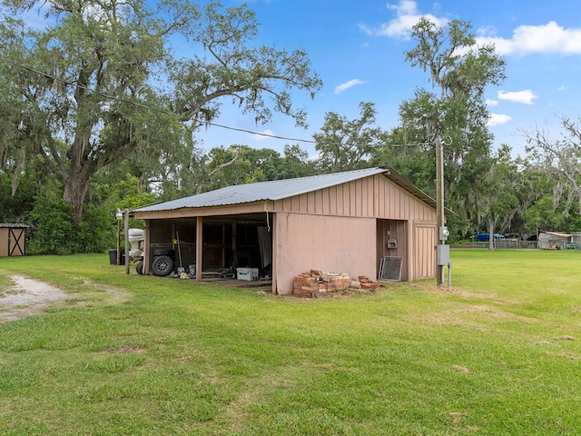 4432 County Road 886, Brazoria, TX 77422 - view of pole building featuring a yard