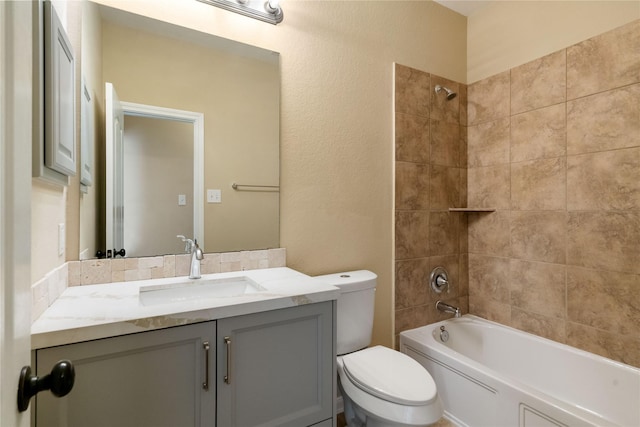 38 Tallgrass Way, Spring, TX 77389 - full bath with vanity, washtub / shower combination, and a textured wall