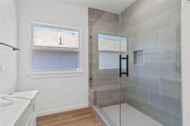 4102 Kewanee St, Houston, TX 77051 - bathroom featuring wood finished floors, a stall shower, and vanity