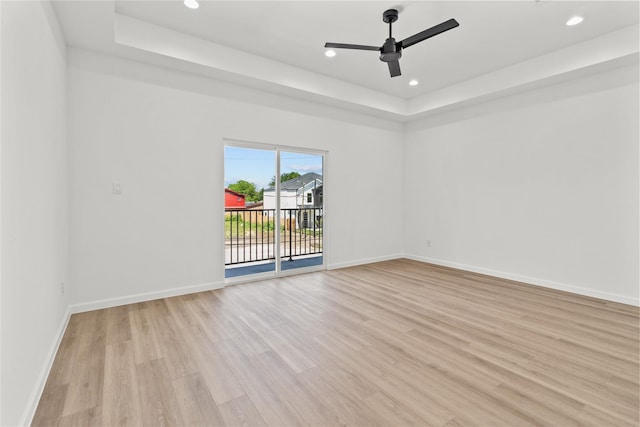 4102 Kewanee St, Houston, TX 77051 - unfurnished room with a raised ceiling, light wood-style floors, a ceiling fan, and recessed lighting