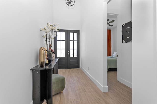 825 Rd 5501, Cleveland, TX 77327 - foyer entrance with french doors and light wood-style floors