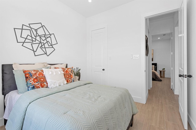 825 Rd 5501, Cleveland, TX 77327 - bedroom with light wood-style flooring and recessed lighting