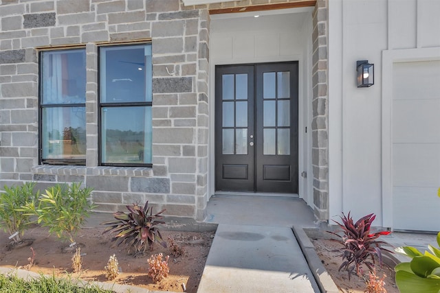 825 Rd 5501, Cleveland, TX 77327 - property entrance featuring french doors and stone siding