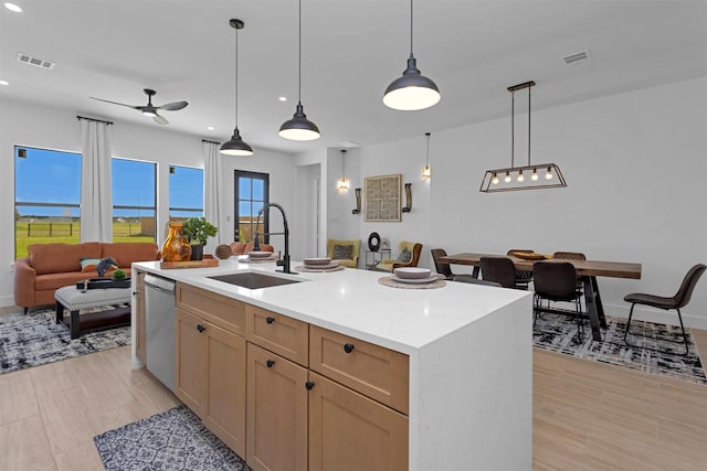 825 Rd 5501, Cleveland, TX 77327 - kitchen featuring stainless steel dishwasher, ceiling fan, pendant lighting, open floor plan, and recessed lighting