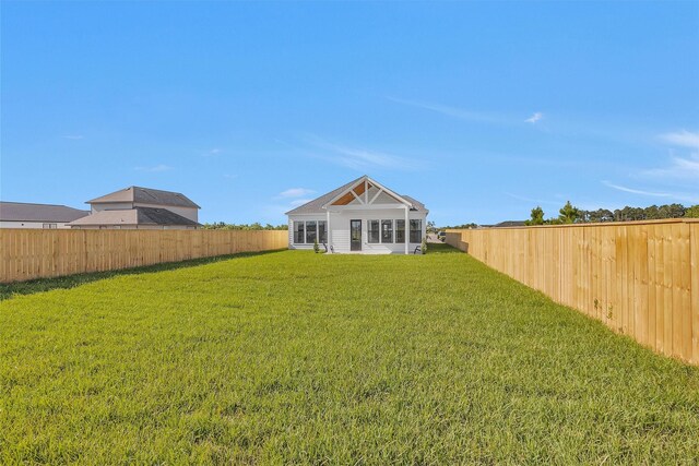 825 Rd 5501, Cleveland, TX 77327 - fenced backyard with a sunroom