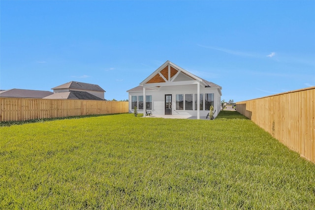 825 Rd 5501, Cleveland, TX 77327 - back of house featuring a fenced backyard and a patio