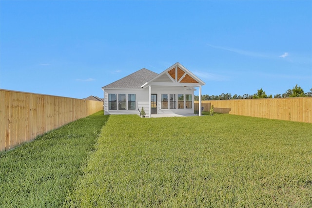 825 Rd 5501, Cleveland, TX 77327 - rear view of property featuring a fenced backyard, a patio area, and roof with shingles