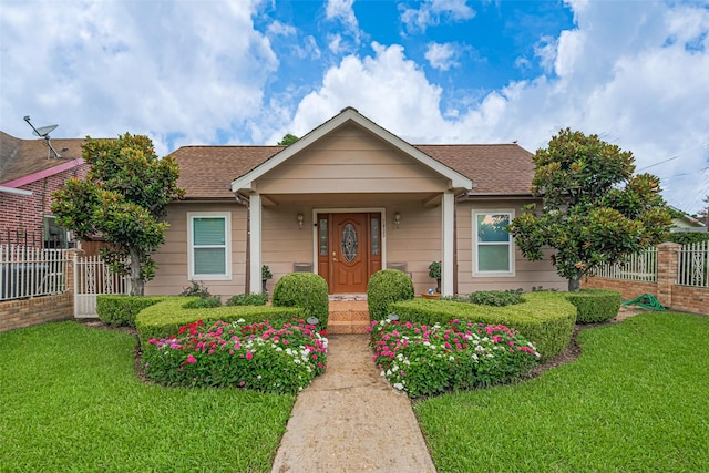 7833 Narcissus St, Houston, TX 77012 - bungalow-style home with roof with shingles